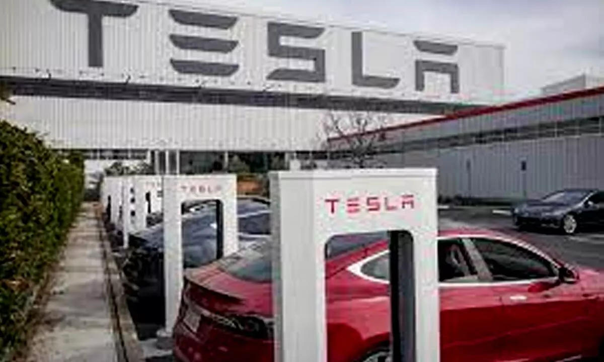 Tesla recalls more than 120K vehicles over door safety issue