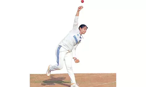 Kaurs twin strikes help India reduce Oz to 233/5