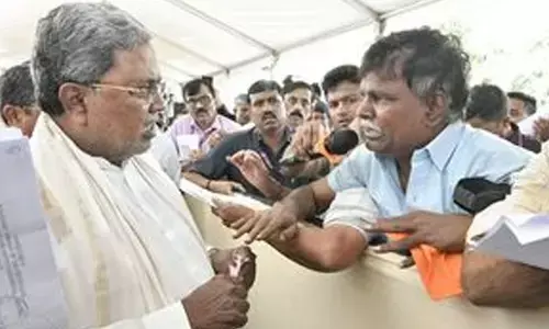 Cong holds up its report card as BJP seals alliance with JD(S)