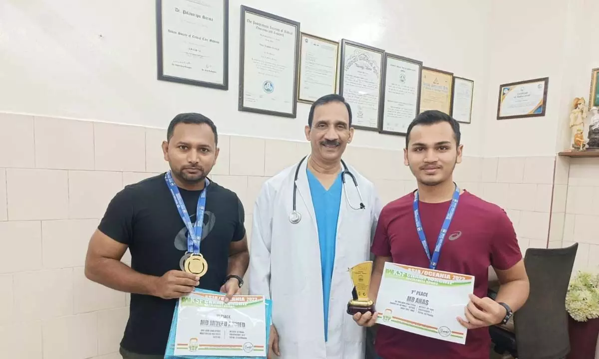AP Girevoy Sport Association president Dr PV Raghava Sarma with athletes Md Anas, Md Javed Ahmed who bagged medals in the World Kettlebell Sport Federation Asia/Oceania Championship held at Mumbai