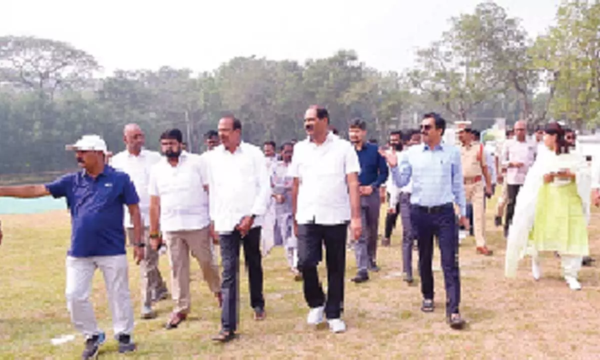 Collector  Venugopal Reddy along with CM tour programme coordinator Talasila Raghuram and others reviewing arrangements for Aadudam Andhra in Guntur on Monday