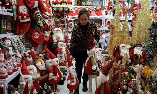 Christmas in China brings glittering decor and foreign influence concerns