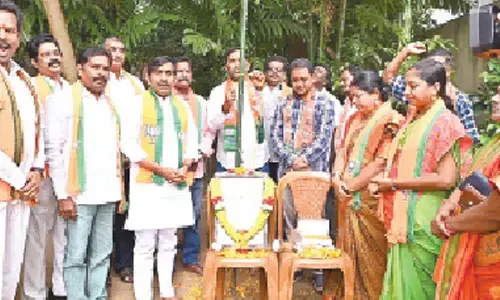 BJP leaders celebrating birth anniversary of AB Vajpayee in Eluru on Monday