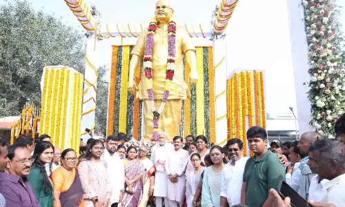 Minister of State for Animal Husbandry, Dairying and Fisheries of India Parshottam Rupala, among others, unveiling the statue of Visakha Dairy chairman late Adari Tulasi Rao in Visakhapatnam on Tuesday