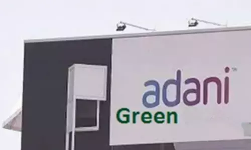 Adani Green completes JV with TotalEnergies, raises USD 300 mn