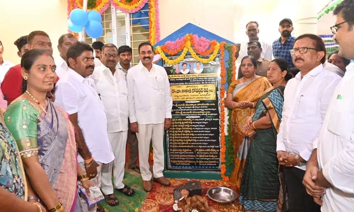 Agriculture Minister Kakani Govardhan Reddy inaugurating multi-purpose godown at South Amuluru village on Saturday