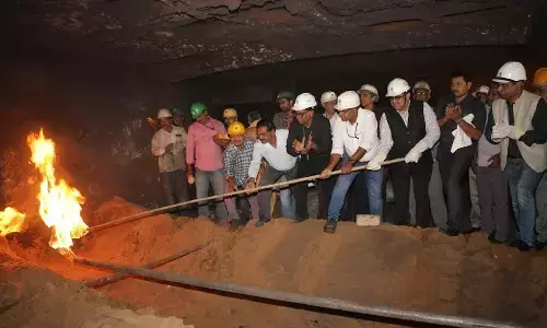 RINL CMD Atul Bhatt and the team lighting BF-3 in Visakhapatnam