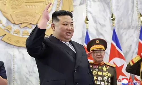 North Korea to launch 3 more military spy satellites, build more nukes next year