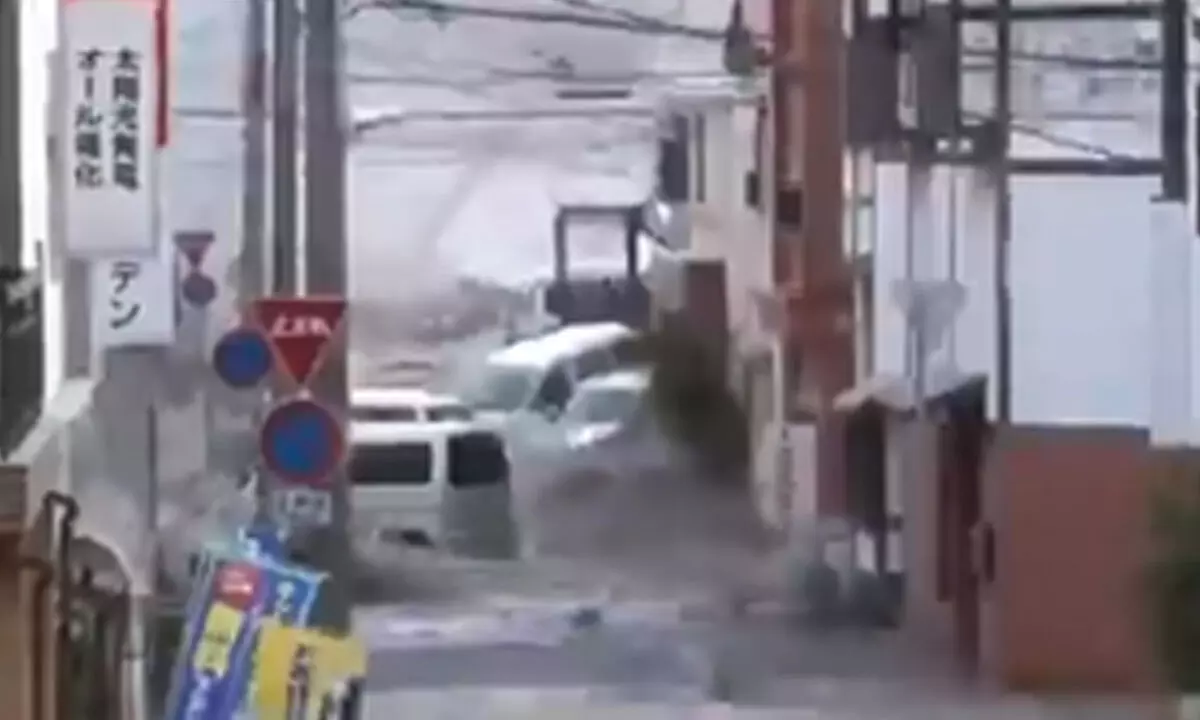 Tsunami waves reach Japans coast following major quakes