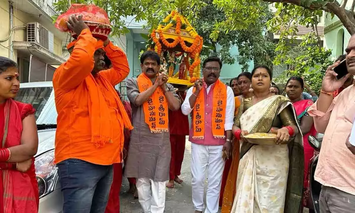 BJP leaders participating in a Grah Sampark Abhiyan campaign in Visakhapatnam on Monday