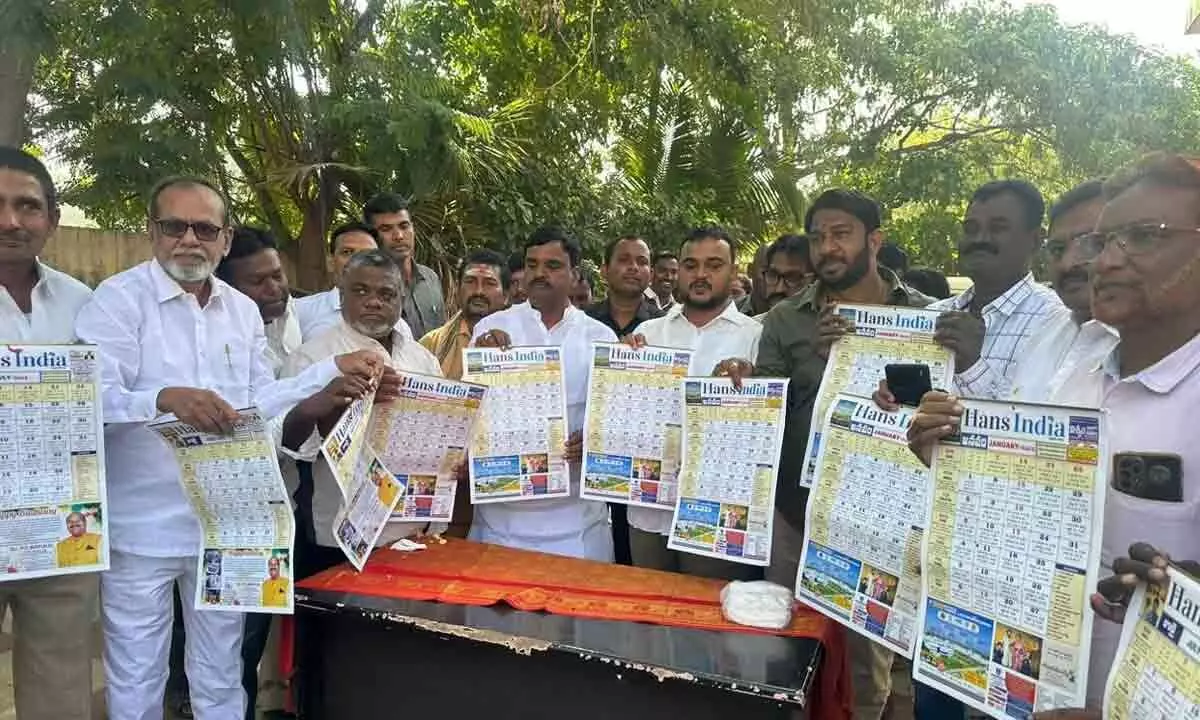 Deputy CM Amjad Basha, Deputy Mayor Nityananda Reddy and YSRCP leader Ahmad Basha releasing The Hans India calendar 2024 in Kadapa on Monday