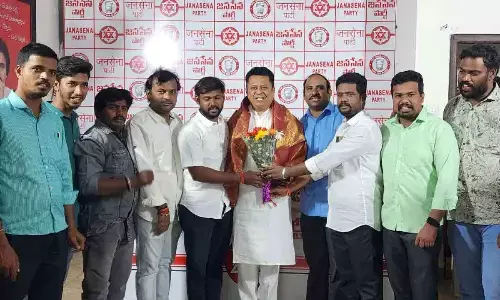 Jana Sena Party leaders celebrating New Year with the party district president Dr Pasupuleti Hariprasad in Tirupati on Monday