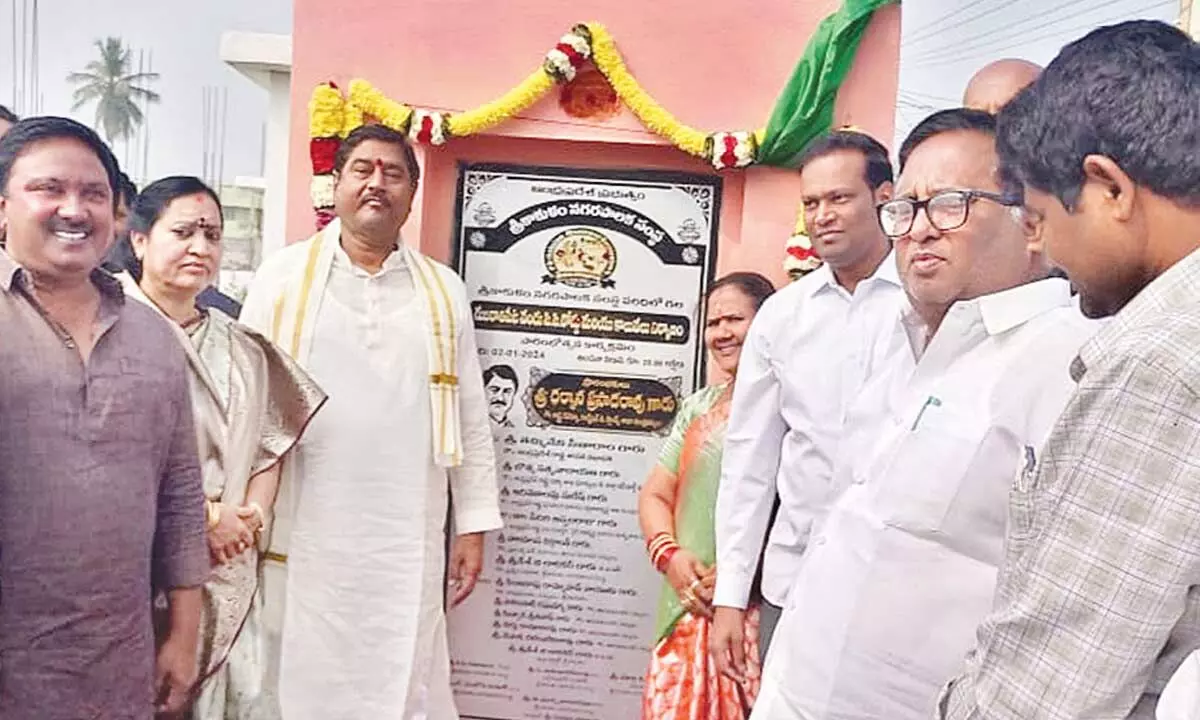 Revenue minister Dharmana Prasada Rao inaugurates CC road at Gujarathipeta in Srikakulam city on Tuesday