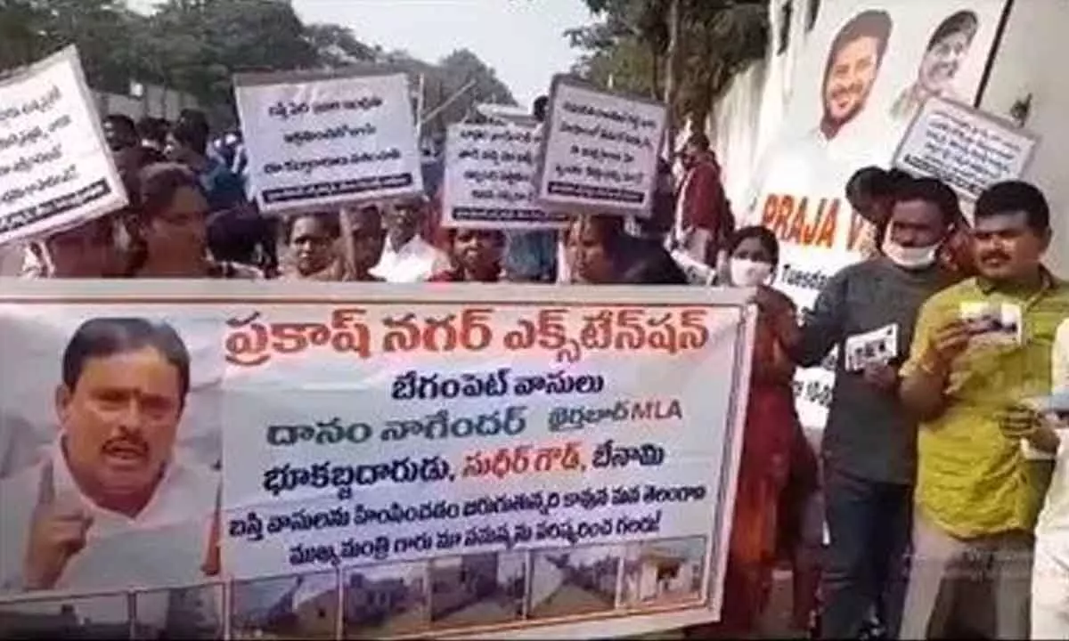 Prakashnagar residents protest against MLA Danam Nagender