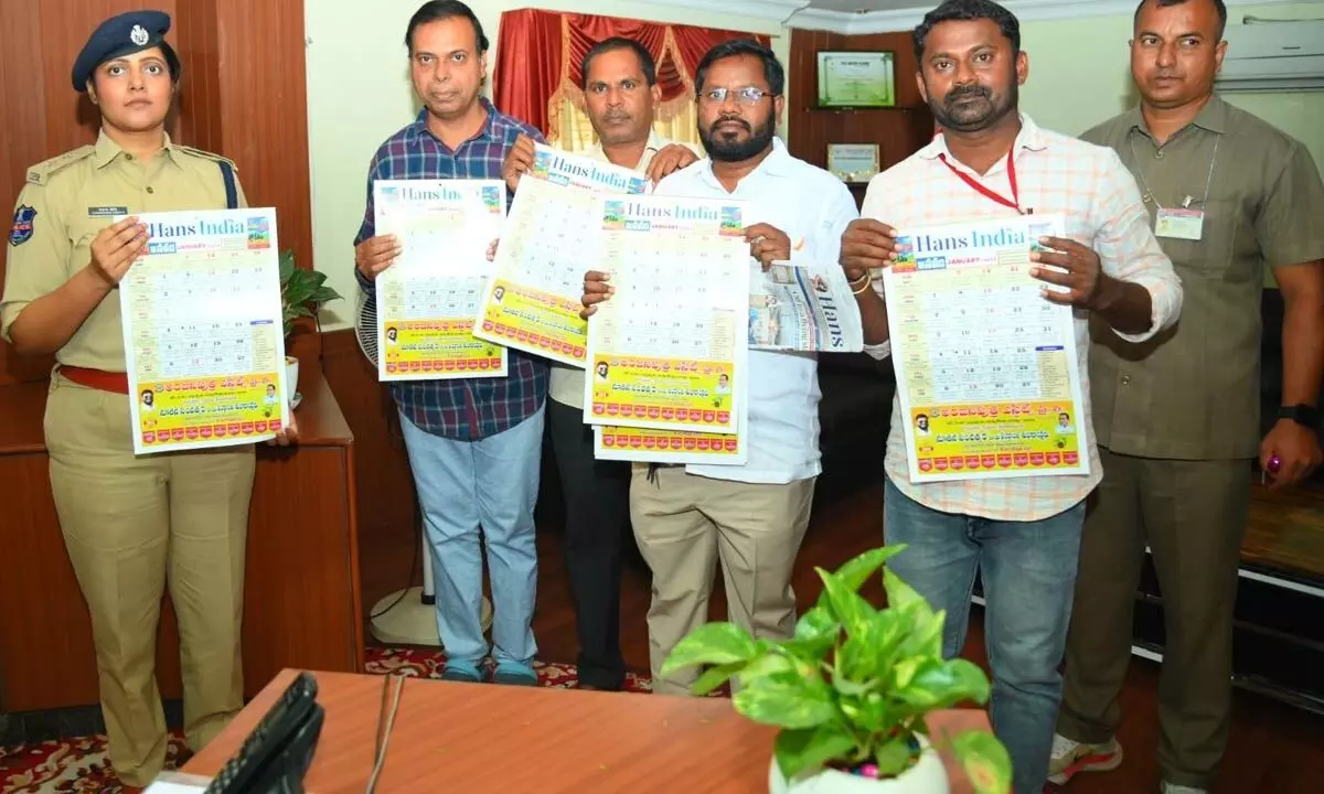 District SP Chandana Deepthi along with The Hans India Nalgonda District crew unveiling ‘The Hans India New Year 2024’ Calendar at her changer in Nalgonda on Tuesday