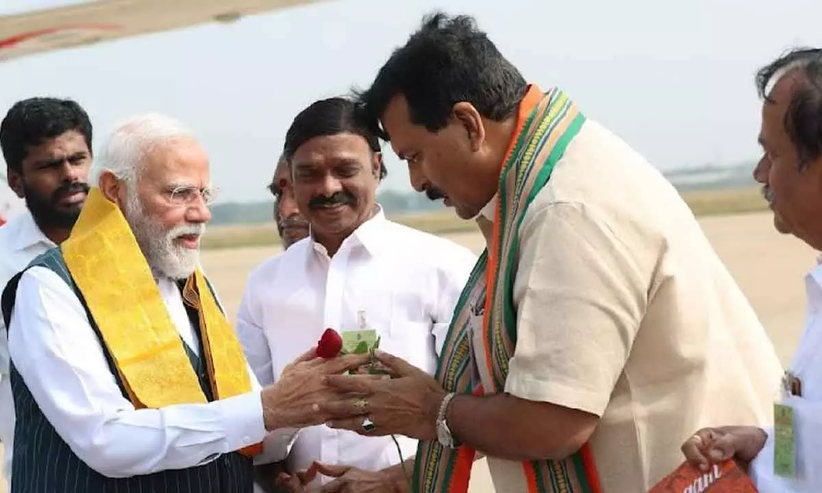 PM Modi receives warm welcome from BJP leaders including Ponguleti Sudhakar Reddy in Trichy