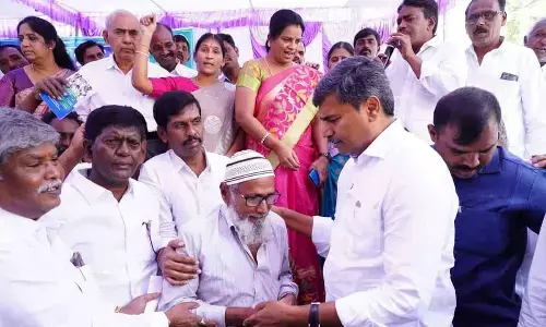 Puttaparthi MLA and beneficiaries pour milk on YS Jagan effigy for increasing pension