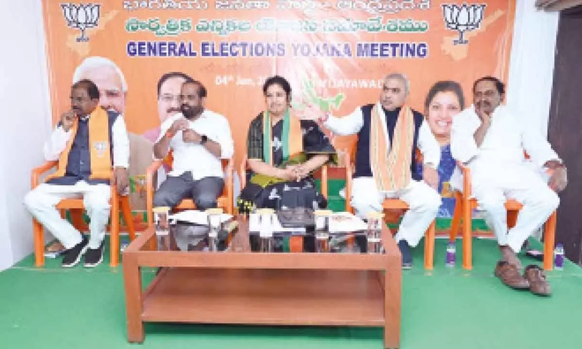 BJP leaders Shiv Prakash, Daggubati Purandeswari, Y Satya Kumar and others at the party core committee meeting in Tadepalli on Thursday