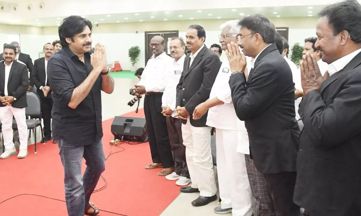 A group of delegates calls on Jana Sena Party chief Pawan Kalyan to seek his support against AP Land Titling Act, at party state headquarters in Mangalagiri on Friday