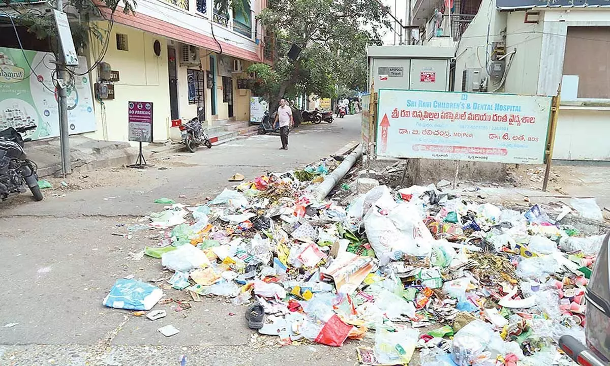 Garbage piled up at a street in Tirupati on Friday