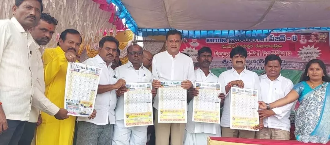 MLC Challa Venkatramireddy unveils The Hans India calendar along with MLA Vijayudu