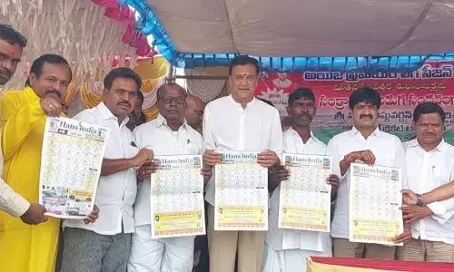 MLC Challa Venkatramireddy unveils The Hans India calendar along with MLA Vijayudu