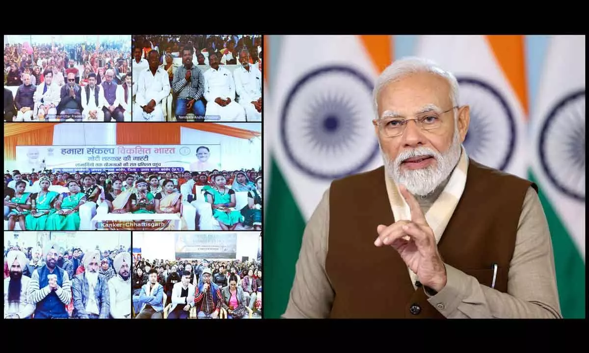 Prime Minister Narendra Modi interacts with beneficiaries of the Viksit Bharat Sankalp Yatra via a video conference, on Monday