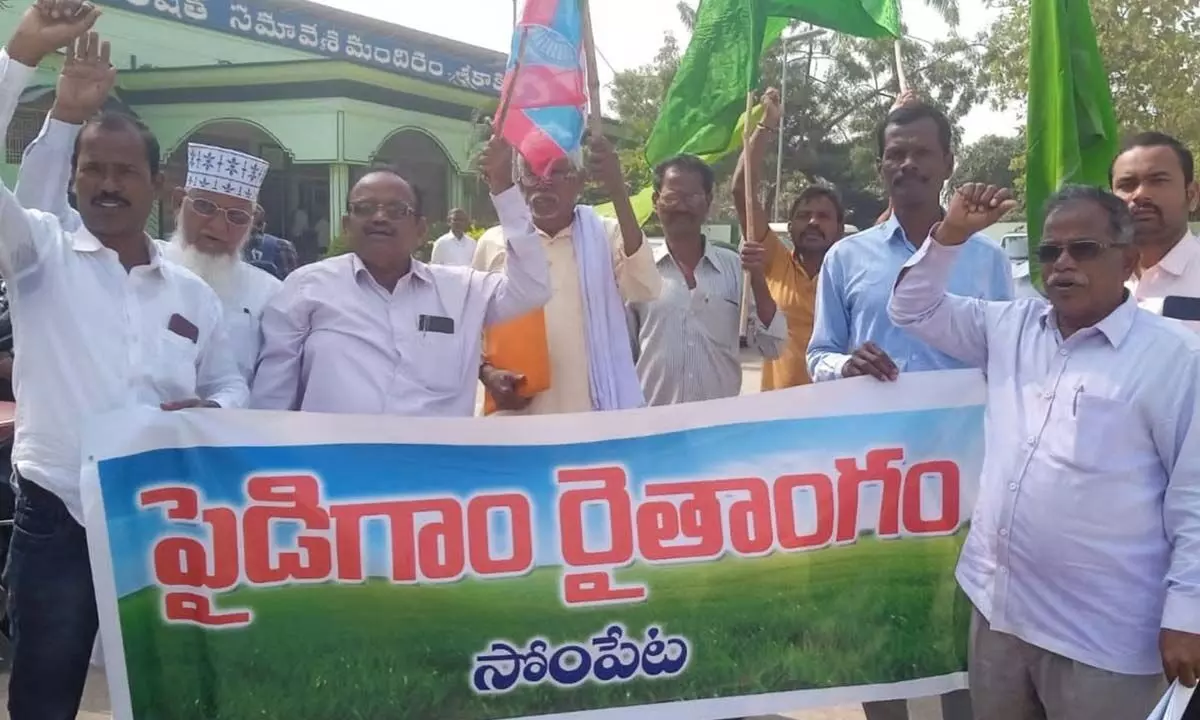 Farmers staging agitation demanding repairs to Pydigam project in Sompeta mandal, in Srikakulam on Monday