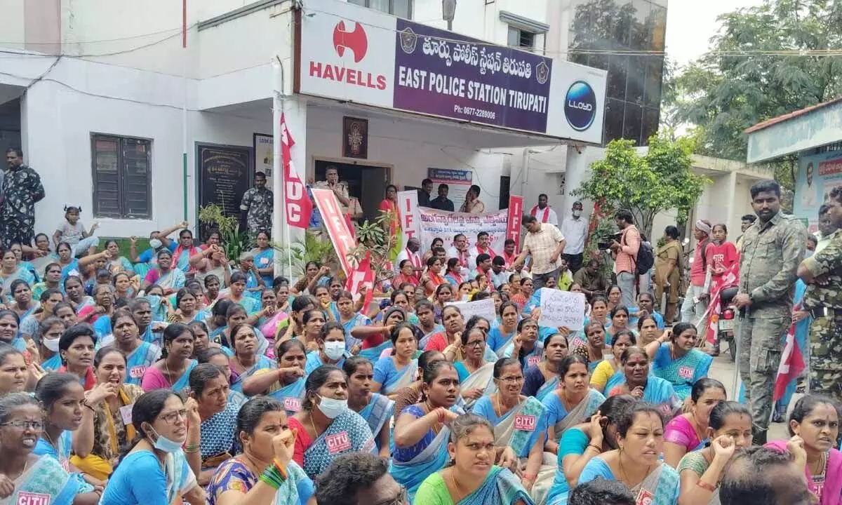 Anganwadi workers staging a dharna in front of the East Police Station in Tirupati on Tuesday