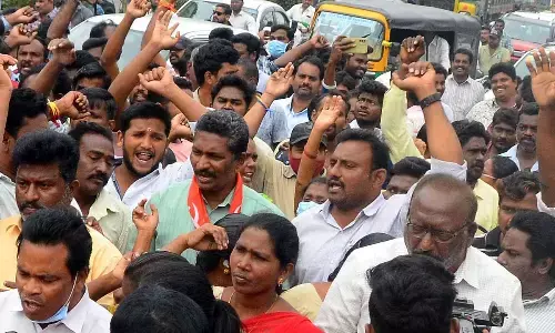 Municipal workers and leaders of CPM being arrested by police at the Collector’s office in Vijayawada on Monday   Photos: Ch Venkata Mastan