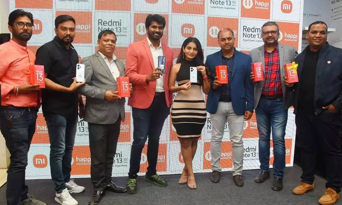 Tollywood actress Ananya Nagalla launches the Redmi Note 13 5G series at Happi Mobiles store in Banjara Hillson Tuesday