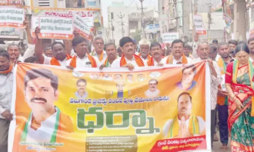 BJP leaders and workers taking out a rally before staging a protest in Markapuram on Tuesday