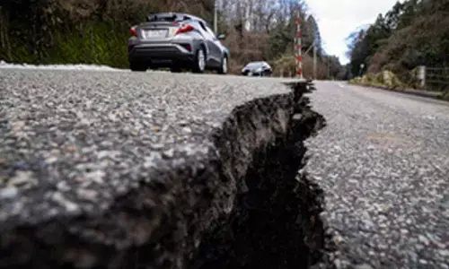 Japan quake toll spikes to 203