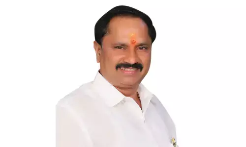 KK Raju unveils poster of launch of Dr BR Ambedkar statue in Visakhapatnam