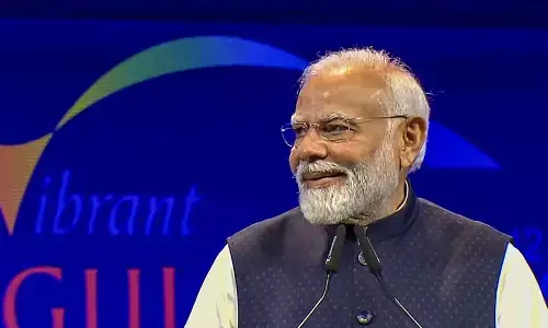 Prime Minister Narendra Modi addresses during the Vibrant Gujarat Global Summit 2024, in Gandhinagar on Wednesday