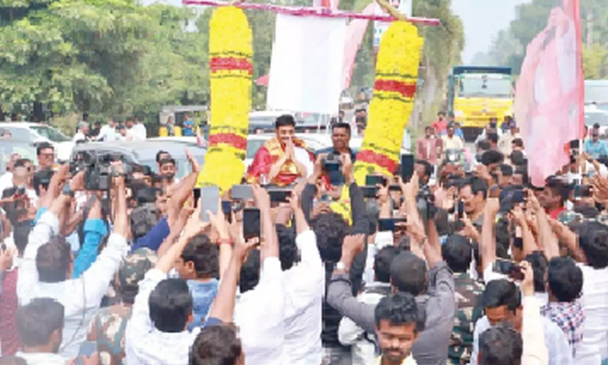 Supporters accord a rousing welcome to YSRCP rebel MP K Raghu Rama Krishnam Raju on his arrival at airport in Rajamahendravaram on Saturday