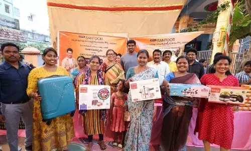MLA Chevireddy Bhaskar Reddy’s wife Chevireddy Lakshmi, Harshit Reddy and Wipro area manager Akbar Basha with the winners of Rangoli competition in Tirupati on Saturday