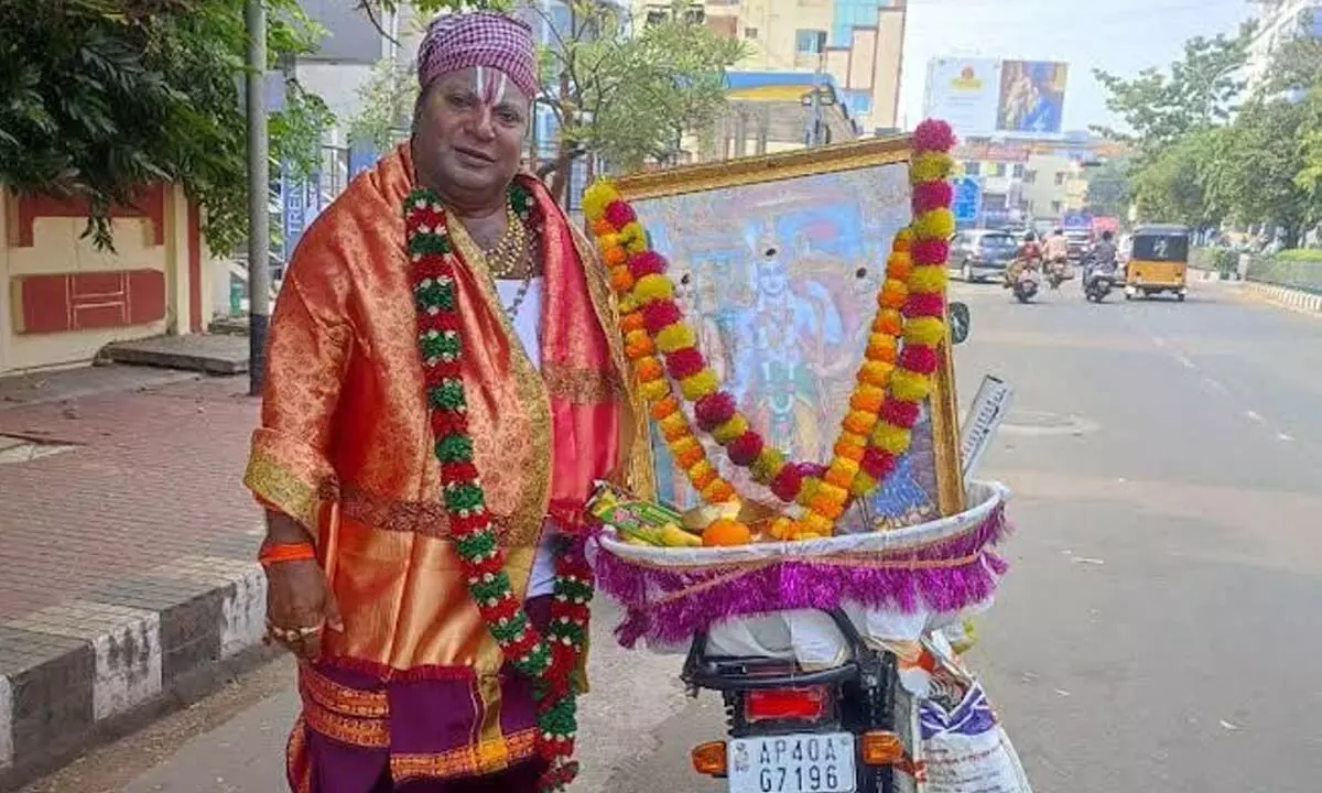 Haridasu travelling in a two-wheeler in Visakhapatnam.  Photo: Vasu Potnuru