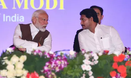 Chief Minister Y S Jagan Mohan Reddy interacting with Prime Minister Narendra Modi at the launch of NACIn in Palasamudram on Tuesday