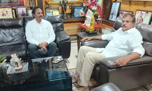 Vasupalli Ganesh meets Botsa Satyanarayana and his wife