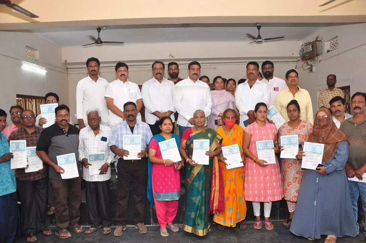 Adari Anand distribution registration documents of 60 houses in Vizag