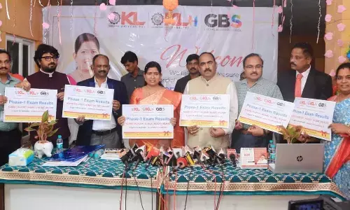 Home Minister Taneti Vanitha, KL University vice-chancellor Dr G Pardha Saradhi Varma and  others releasing exam results in Vijayawada on Friday (Photo Ch Venkata Mastan)