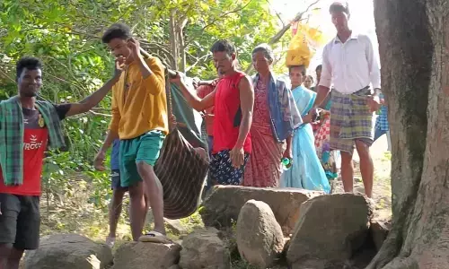 Sick man carried in doli for 7 km