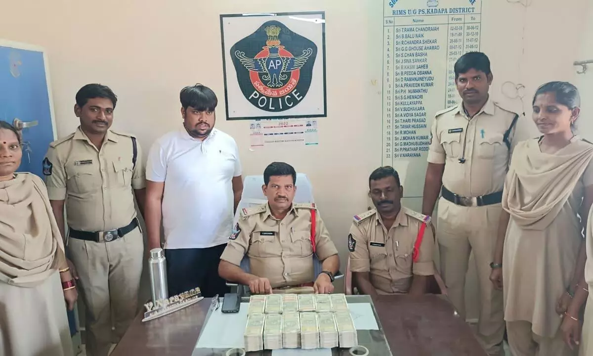 Police producing the seized cash before the media in Kadapa on Saturday