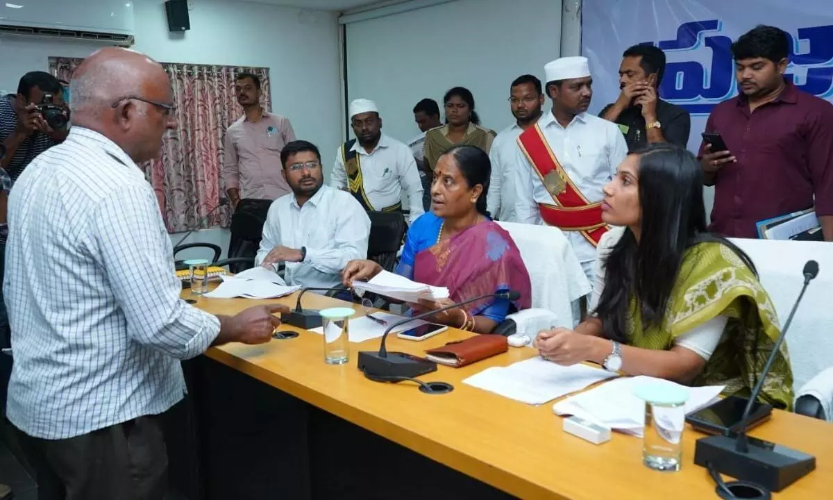 Minister for Endowments, Forests and Environment Konda Surekha receiving grievances from people at the Prajavani programme in Warangal Collectorate on Monday