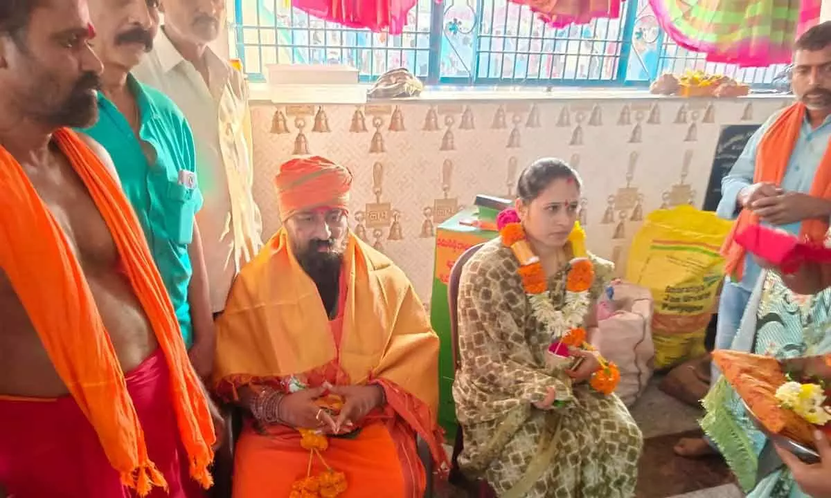 Perumalla Jeevananda Reddy and his wife participate in Ankalamma Jatara