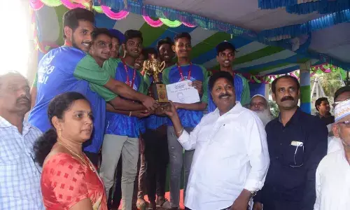 AP Minister Karumuri Venkata Nageswara Rao presents awards to winners of Adudham Andhra