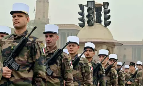 French Rafales, marching contingent take part in R Day parade