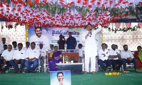 Atmakuru MLA Mekapati speaking at a meeting after distributing DR YSR Aasara scheme beneifts at AS Pet mandal on Saturday
