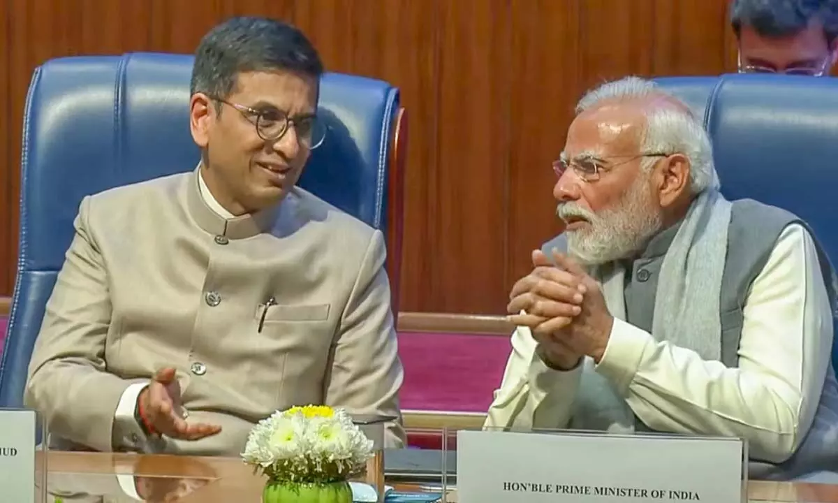 Prime Minister Narendra Modi and Chief Justice of India Justice D.Y Chandrachud during the 75th year celebrations of the Supreme Court of India, in New Delhi on Sunday